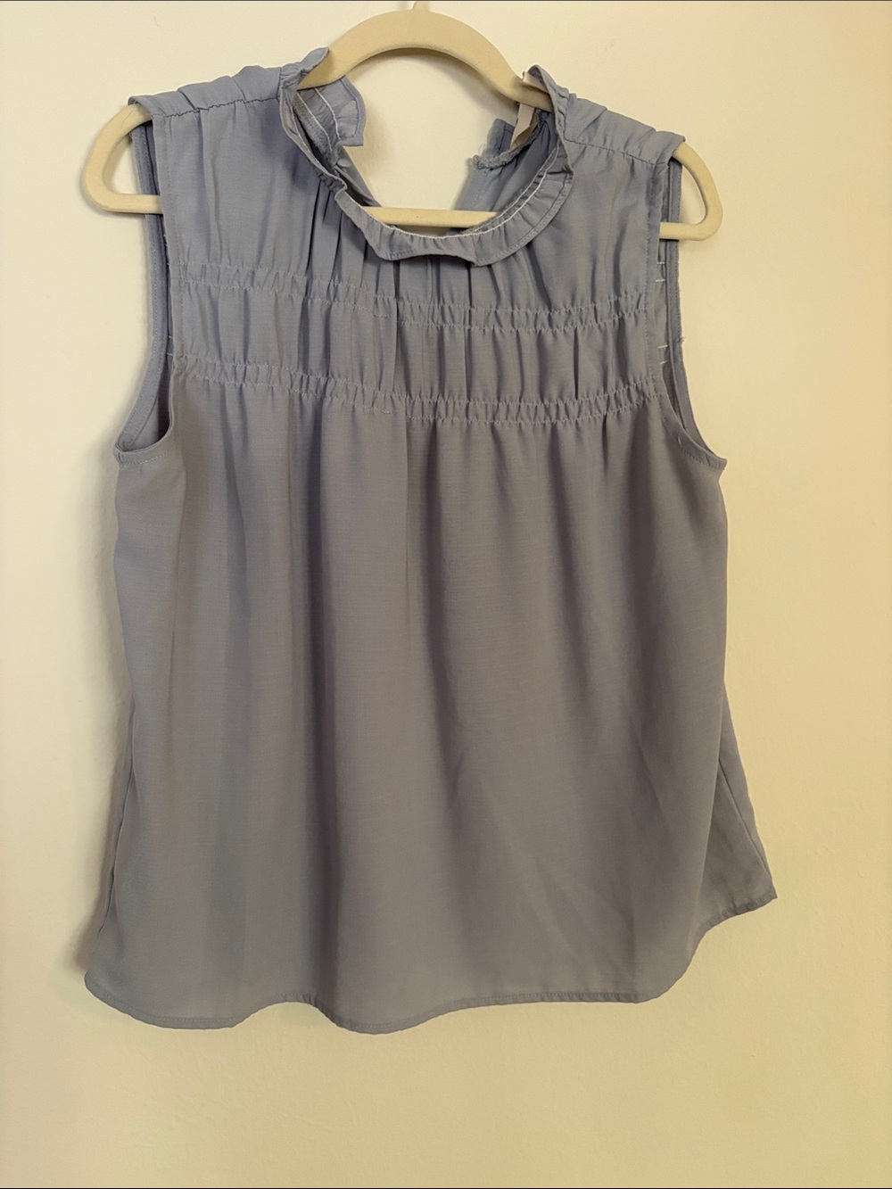 The Impeccable Pig Sleeveless Ruffle Neck Smocked Top - Light Blue
